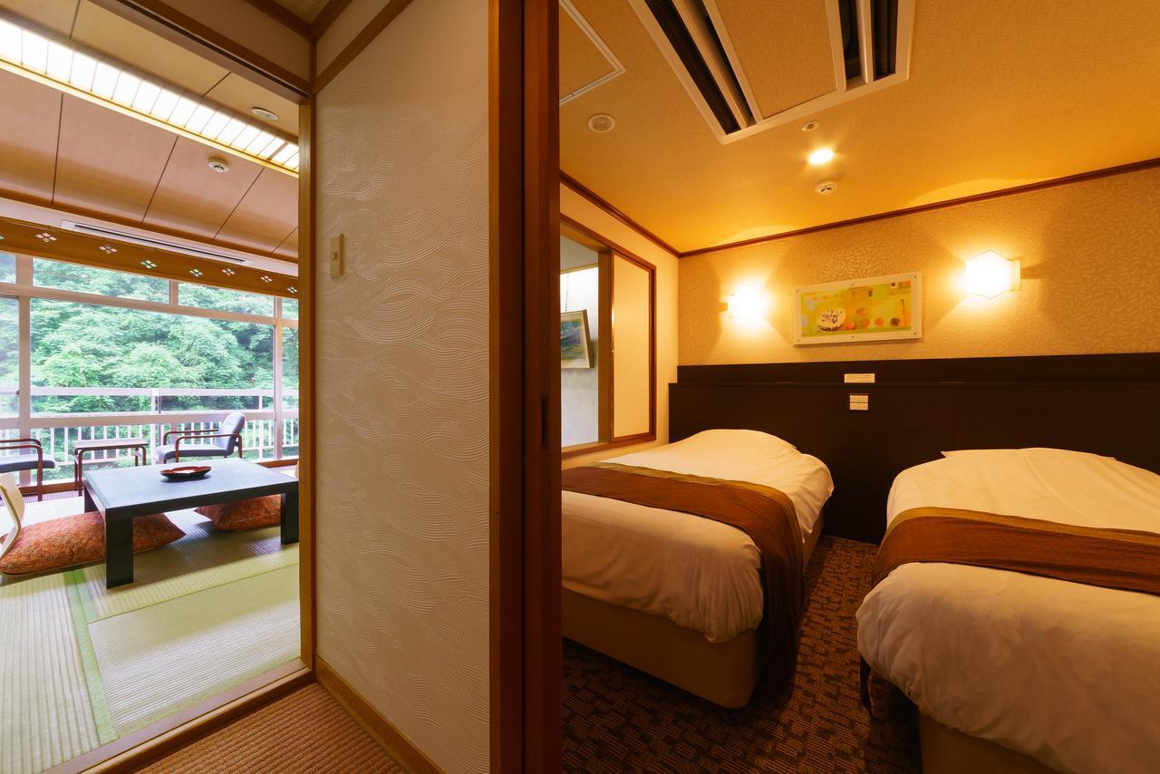 Iizaka Hotel Juraku Fukushima  Bagian luar foto
